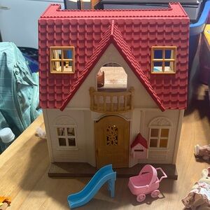 Calico Critters Dollhouse Playset with dolls and accessories
